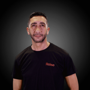 Sofiane wearing the black Raise TShirt